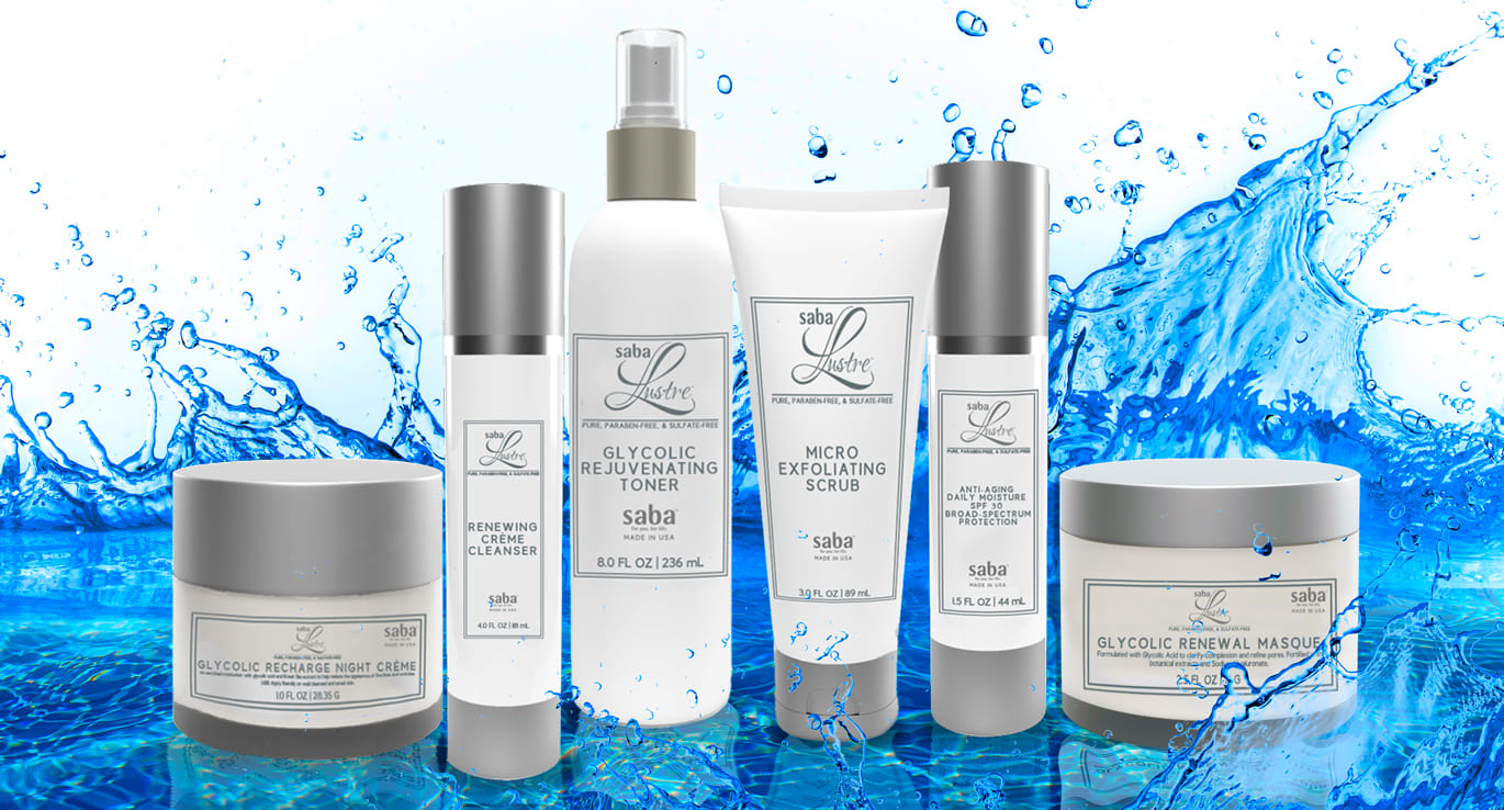 Collection of Saba Lustre skincare products, including cleansers, toners, creams, and scrubs, arranged in front of a dynamic splash of water.